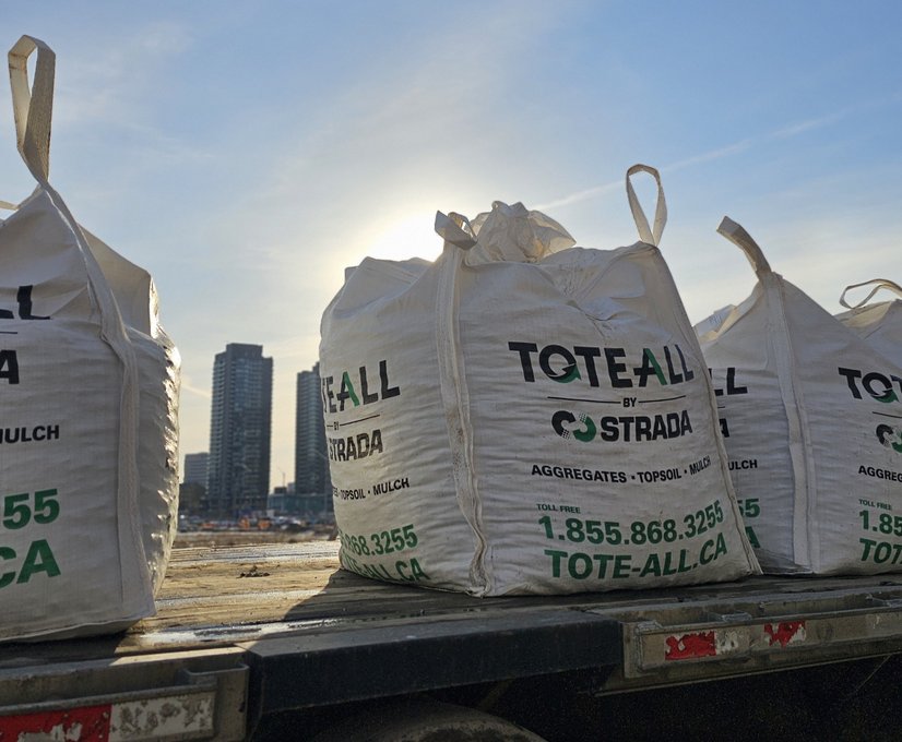 hundreds of one-ton totes in a pile